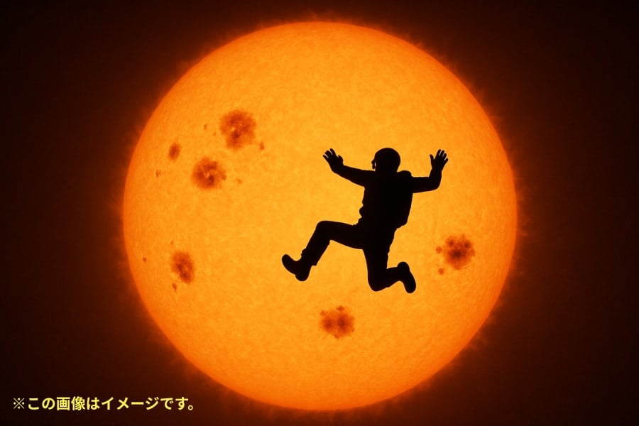 【奇跡の一枚】太陽を背景にダイブする写真を撮影