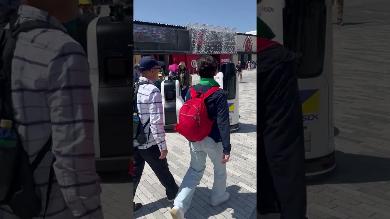 万博会場でアルソックとセコムの警備ロボットがにらみ合い？「きっと互いをしょっぴきたい」 どういう状況か聞いた