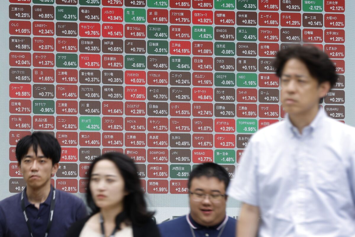 日本株は続伸、米経済指標が利下げ観測支え－半導体や内需に買い