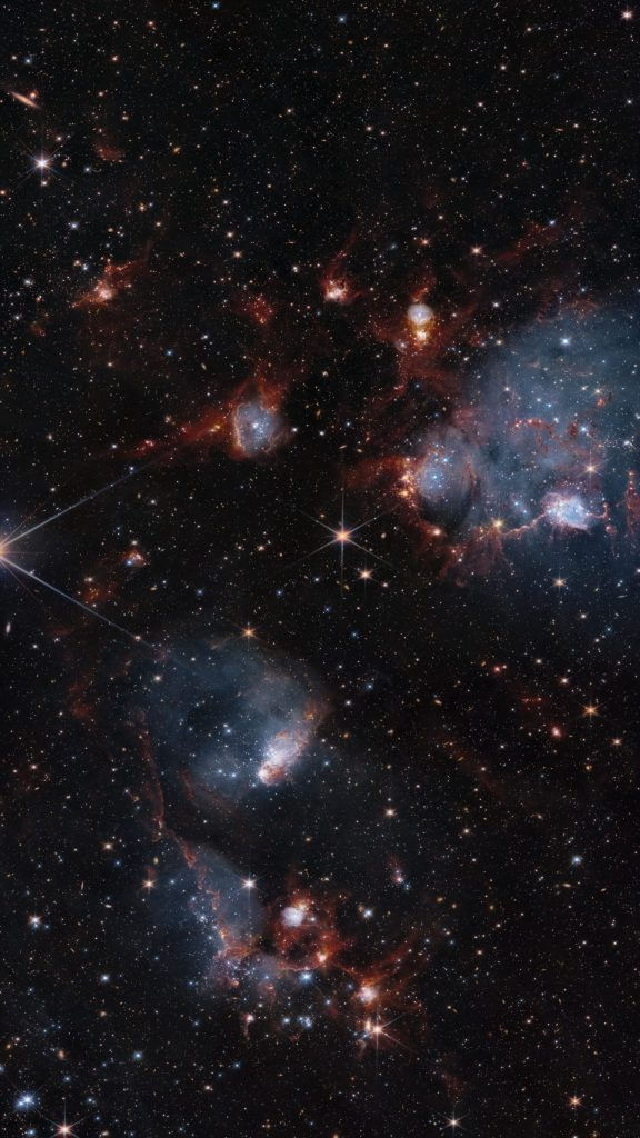 20万光年先で輝く若き星々 ハッブル宇宙望遠鏡とジェームズ・ウェッブ宇宙望遠鏡が観測した2つの散開星団